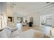 Bright and airy living room with sliding glass doors, tile flooring, and views of the outdoors at 5091 Creekside Trl, Sarasota, FL 34243
