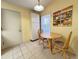 Kitchen breakfast nook with table and chairs, tile flooring, and natural lighting at 5804 Garden Lakes Fern, Bradenton, FL 34203