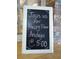 Happy Hour sign is a warm invite to start your weekend at the community center at 5804 Garden Lakes Fern, Bradenton, FL 34203