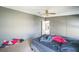 Bedroom featuring a ceiling fan and neutral colored walls and floors at 5829 Coventry Dr, Tampa, FL 33615