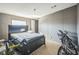 Bedroom featuring a black headboard bed and a bicycle at 5829 Coventry Dr, Tampa, FL 33615