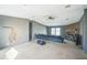Expansive living room with ceiling fan, fireplace, and ample space at 5829 Coventry Dr, Tampa, FL 33615