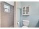 Updated bathroom showcasing tiled shower stall and vanity at 602 Park Cir, Bradenton, FL 34207