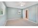 Bright bedroom featuring a ceiling fan and a window letting in natural light at 602 Park Cir, Bradenton, FL 34207