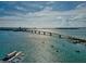 Scenic aerial view of a bridge spanning across the water with boats sailing nearby at 6248 Donnington Ct, Sarasota, FL 34238
