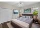 Cozy bedroom featuring a neutral color palette and plush bedding at 6248 Donnington Ct, Sarasota, FL 34238