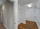 Spacious walk-in closet with wood floors and multiple levels of wire shelving for ample storage space at 6248 Donnington Ct, Sarasota, FL 34238
