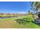 Expansive backyard with mature landscaping and waterfront views offers space for recreation and relaxation at 6422 Auburn Ave, Bradenton, FL 34207
