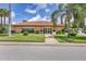 Cambridge Village clubhouse with desert landscaping and a welcoming entrance for community gatherings at 6422 Auburn Ave, Bradenton, FL 34207
