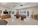Bright game room with a billiard table and plenty of space for entertaining in this community at 6422 Auburn Ave, Bradenton, FL 34207