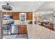 Updated kitchen with stainless steel appliances, granite countertops, and an open design for easy entertaining at 6422 Auburn Ave, Bradenton, FL 34207