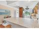 Bright, updated kitchen with a large granite countertop island, stainless steel appliances, and ample natural light at 6422 Auburn Ave, Bradenton, FL 34207