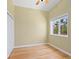 Comfortable bedroom with bright windows, closet space and hardwood floors at 7320 Melaleuca Way, Siesta Key, FL 34242