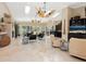 Spacious open-concept living area with a fireplace, skylights and multiple ceiling fans at 7320 Melaleuca Way, Siesta Key, FL 34242