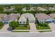 A beautiful single-Gathering home with lush landscaping, and a paver driveway, in a desirable neighborhood at 7717 Sandhill Lake Dr, Sarasota, FL 34241