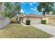 Charming single-Gathering home with a well-manicured lawn and a two-car garage at 7885 Bristol Park Dr, Apollo Beach, FL 33572