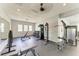 Well-equipped gym featuring free weights, weight machines, and ample workout space at 7885 Bristol Park Dr, Apollo Beach, FL 33572