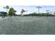 Well-maintained tennis court with professional surfacing and lighting for day or night play at 7911 Grand Estuary Trl # 201, Bradenton, FL 34212