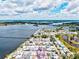 An aerial view of a waterfront community showing a charming home near the water with beautiful river views at 8 Desoto E St, Bradenton, FL 34208