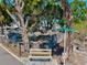 Street view of the historic Braden Castle ruins with adjacent park bench and neighborhood sign at 8 Desoto E St, Bradenton, FL 34208