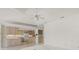 Living room featuring a wet bar, natural light, and an open-concept design at 8 Dominica Dr, Englewood, FL 34223