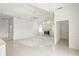 Spacious living room featuring a fireplace, tile flooring, and high ceilings at 8 Dominica Dr, Englewood, FL 34223