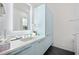 Well-lit bathroom with sleek vanity, modern mirror, and contemporary fixtures, all in a stylish design at 924 Indian Beach Dr, Sarasota, FL 34234