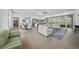 Bright open floor plan featuring a spacious living room, kitchen and dining area at 924 Indian Beach Dr, Sarasota, FL 34234