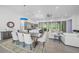 Open concept living area, featuring a kitchen, dining area and living room at 924 Indian Beach Dr, Sarasota, FL 34234