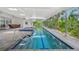 Indoor/outdoor pool offers a tranquil escape and seamless blend with nature at 924 Indian Beach Dr, Sarasota, FL 34234