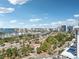 Impressive aerial perspective of a city with a busy marina, and highway at 101 S Gulfstream Ave # 6C, Sarasota, FL 34236