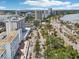 Elevated view of the city showing highways, high rises, and a lake at 101 S Gulfstream Ave # 6C, Sarasota, FL 34236