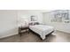 Bright bedroom with a window and neutral decor for relaxation at 101 S Gulfstream Ave # 6C, Sarasota, FL 34236