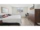 Comfortable bedroom with stylish decor, large bed, and a city view window at 101 S Gulfstream Ave # 6C, Sarasota, FL 34236