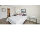 Bedroom view showcases a comfortable bed, side table and ensuite bathroom entrance at 101 S Gulfstream Ave # 6C, Sarasota, FL 34236
