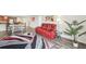 Open-concept living area featuring a sofa, decorative rug, and natural lighting at 101 S Gulfstream Ave # 6C, Sarasota, FL 34236