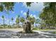 Memorial statue commemorating military veterans surrounded by palm trees and landscaping in a serene park setting at 101 S Gulfstream Ave # 6C, Sarasota, FL 34236