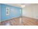 This bedroom has laminate floors and lots of natural light at 104 Hourglass Dr, Venice, FL 34293