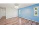 This bedroom has laminate flooring and lots of natural light at 104 Hourglass Dr, Venice, FL 34293