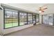 This Sunroom has large windows with a view to the yard at 104 Hourglass Dr, Venice, FL 34293