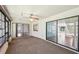 Spacious sunroom with sliding doors provides access to indoors and outdoors at 104 Hourglass Dr, Venice, FL 34293