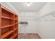 Walk-in closet with multiple shelves and clothing racks at 104 Hourglass Dr, Venice, FL 34293