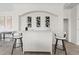 Stylish bar area with custom display racking and white bar at 10820 Tarflower Dr # 202, Venice, FL 34293