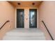 Elegant double front doors with decorative glass inserts offer privacy and architectural detail at 10820 Tarflower Dr # 202, Venice, FL 34293