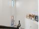 Bright staircase with a decorative door and curated décor at 10820 Tarflower Dr # 202, Venice, FL 34293