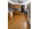 Bright and spacious kitchen with wooden cabinets, modern appliances, and hardwood floors at 1212 Candlewood Dr, Lakeland, FL 33813
