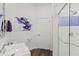 Clean bathroom features a modern vanity, stylish artwork and a glass-enclosed shower at 13115 Harriers Pl, Bradenton, FL 34212