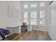 Bright and modern office space with hardwood floors and large windows at 13115 Harriers Pl, Bradenton, FL 34212
