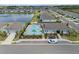 Aerial showcasing the pool and surrounding residences within the community at 13915 Mount Laurel Trl, Bradenton, FL 34211