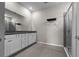 Bathroom featuring double sink vanity, granite countertops, and shower at 13915 Mount Laurel Trl, Bradenton, FL 34211